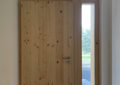 Porte d'entrée vitrée intérieur 3 plis épicéa